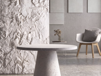 Panneau mural en polyuréthane imitation roche naturelle Roca Nature de Panel Piedra dans un salon moderne.